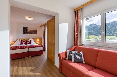 Alpen Apart bedroom and living room