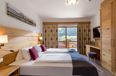 Bedroom in the holiday flat with mountain view